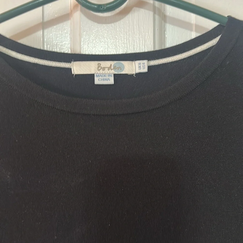 Boden | Black knit dress with white trim on bottom and sleeves. US size 4 - Picture 2 of 3